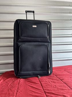 Garment Bag And Suitcase  Thumbnail