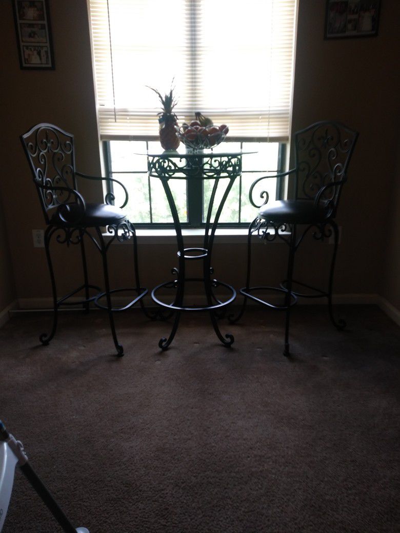 Bistro style table with 2 chairs