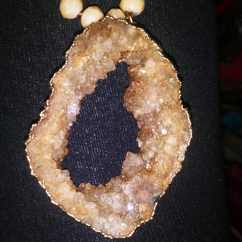 Geode pendant with heavy gold chain