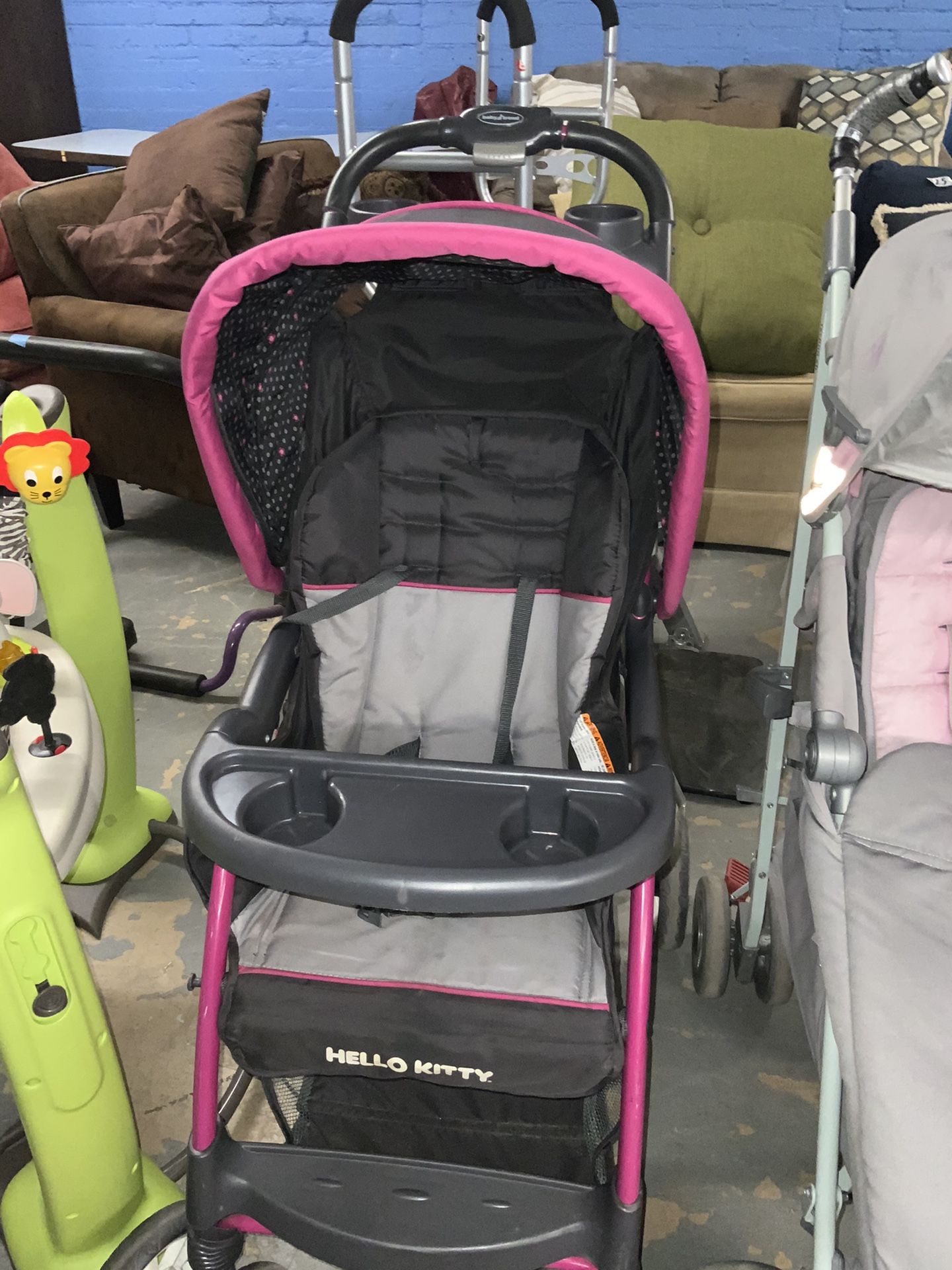 Pink And Black Hello Kitty Stroller